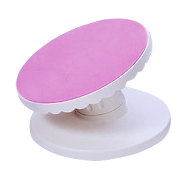 Plastic Revolving Cake Tilting Turntable 23.5 cm Plastic, Pink / White  قرص دوار بلاستيكي قابل للإمالة مقاس 23.5 سم، بلاستيك، وردي/أبيض